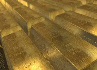 Oro cae desde máximo de un mes por apetito por activos de mayor riesgo
