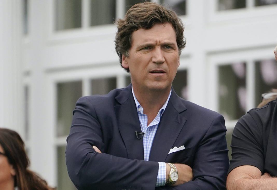 Tucker Carlson, Greg Norman